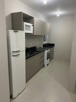 Ótimo apto a 50m da areia churrasq 2Q 2 banheiros 302